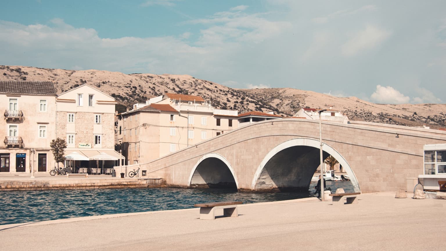 Pag’s stone bridge beside the waterfront